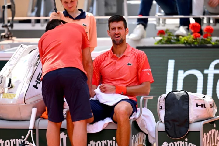 Djokovic into seventh French Open final as Alcaraz hit by injury