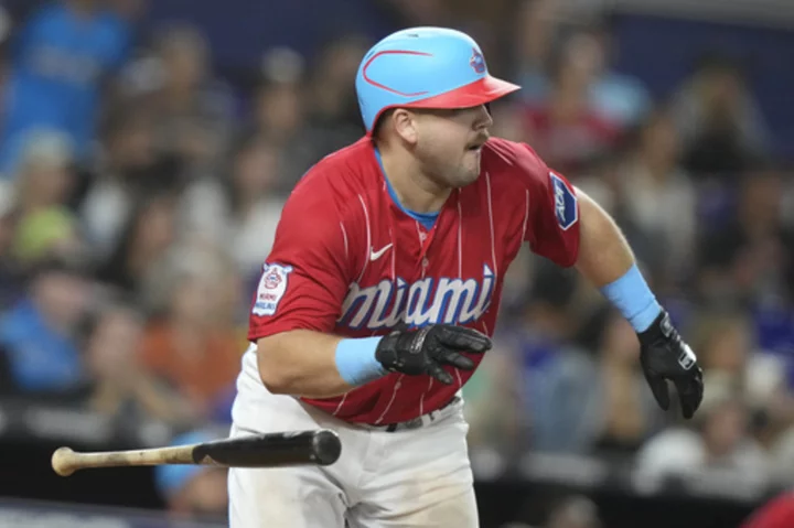 Homers from Burger and Chisholm in 8th lift Marlins to 11-5 win over Braves