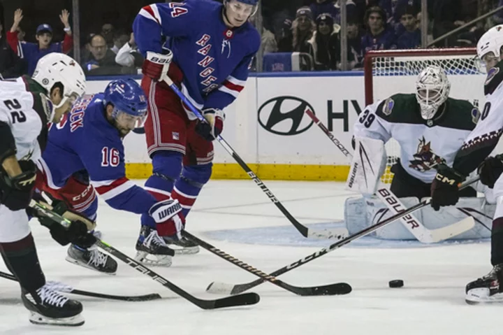 Trocheck and Kreider score as Rangers top Coyotes 2-1 to win home opener behind Shesterkin