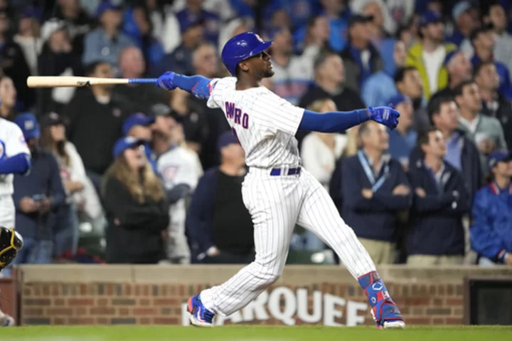 Alexander Canario hits grand slam and Cubs rout Pirates 14-1 to remain in wild card spot