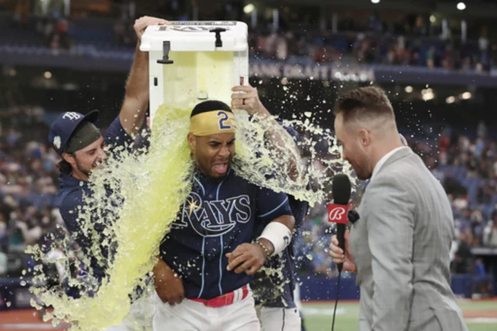 Díaz hits a 2-run homer in the 9th inning to give the Rays a 7-5 win over the Mariners