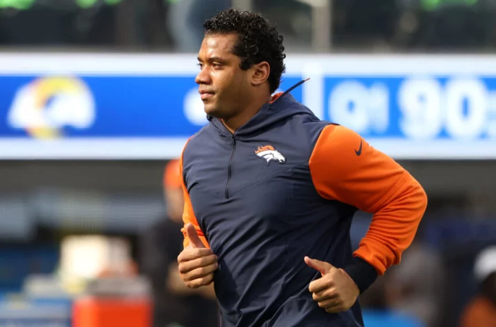 Broncos Country, let's slide!: Russell Wilson works out, hoping year two in Denver works out