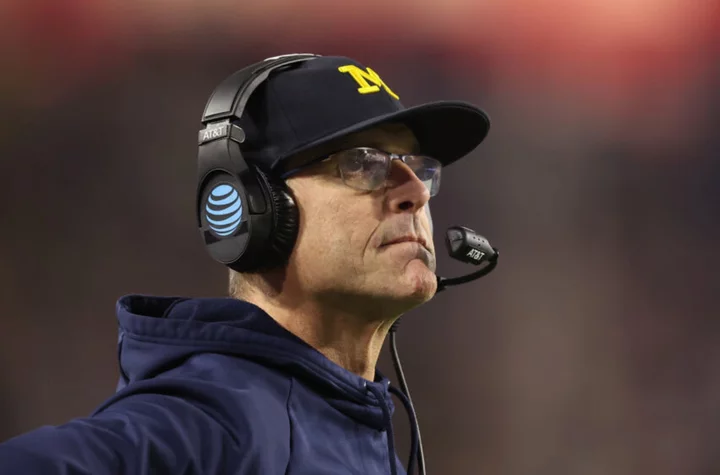 Jim Harbaugh makes it clear: Lawn care over championships