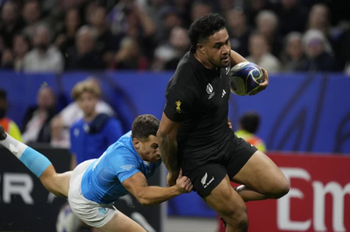 New Zealand withstands Ireland comebacks to win epic Rugby World Cup quarterfinal