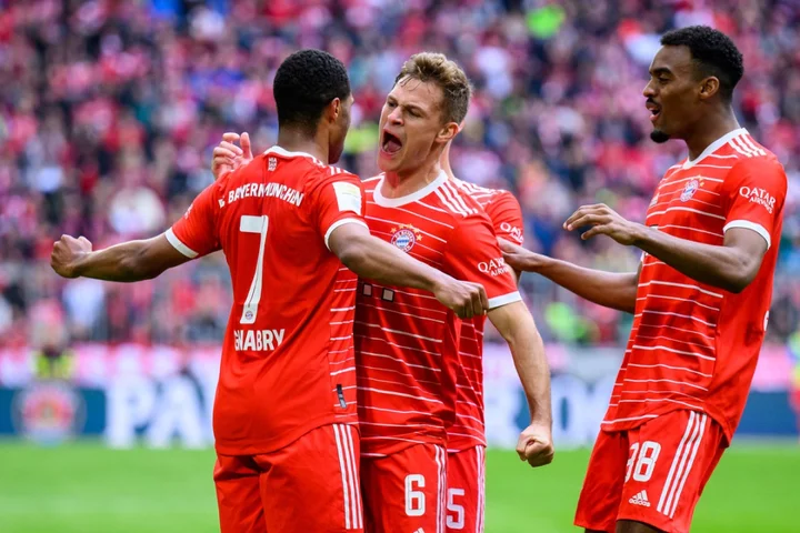 Bundesliga title battle continues as Bayern and Borussia Dortmund ease to wins