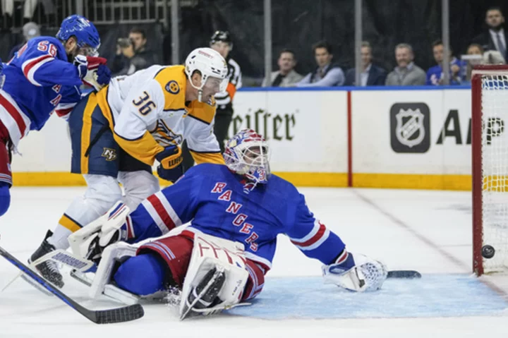 Cole Smith scores 2, Juuse Saros has 23 saves as Predators beat Rangers 4-1