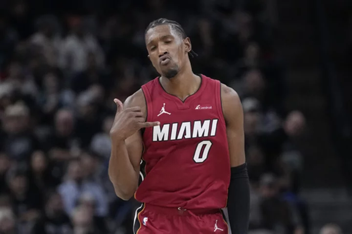 Robinson, Adebayo key rally as Heat capture fifth straight with win over Spurs, 118-113