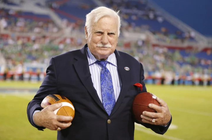 Miami-Louisville winner will receive a trophy recognizing Howard Schnellenberger. Boots included