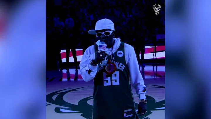 Flavor Flav gives off-key rendition of the US National Anthem at a basketball game