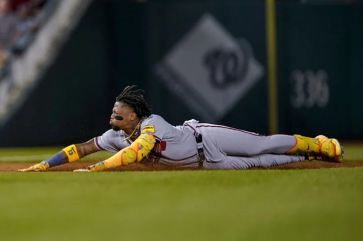 Ronald Acuña's 140th run and Matt Olson's 53rd homer lift the Braves past the Nationals 10-3