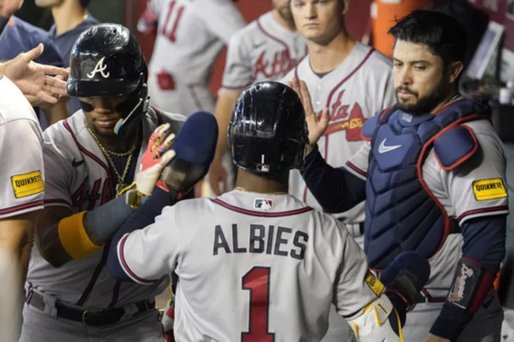 Rosario's grand slam caps Braves' 8-5 comeback win over Diamondbacks