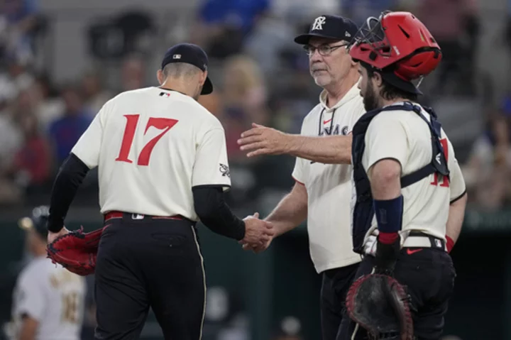 Rangers score go-ahead run on wild pitch to beat A's 3-2; only their 5th win in 21 games