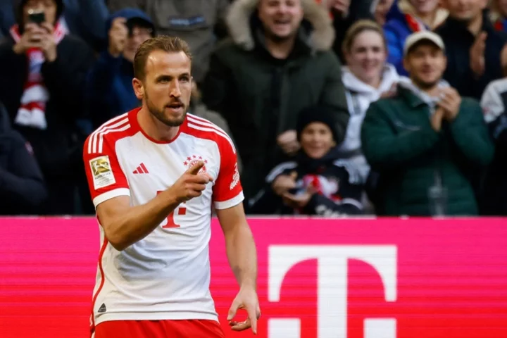 Kane scores brace as Bayern go top, Dortmund lose at Stuttgart