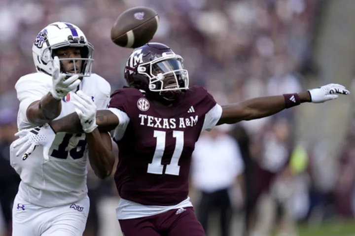 Jaylen Henderson leads Texas A&M to victory in Elijah Robinson's first game as interim coach.