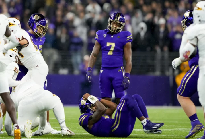 Powell returns late interception 89 yards for TD, No. 5 Washington survives Arizona State 15-7