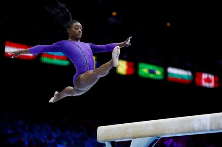 Biles wins beam gold for 22nd world gymnastics title