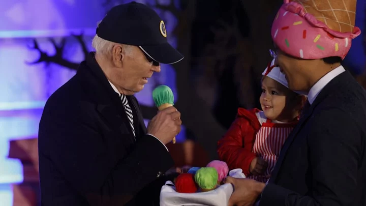 Small Child Fools Joe Biden With Fake Ice Cream at White House Trick-or-Treat Event