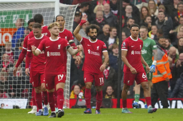 Salah scores twice as Liverpool beats 10-man Everton 2-0 in Merseyside derby in Premier League