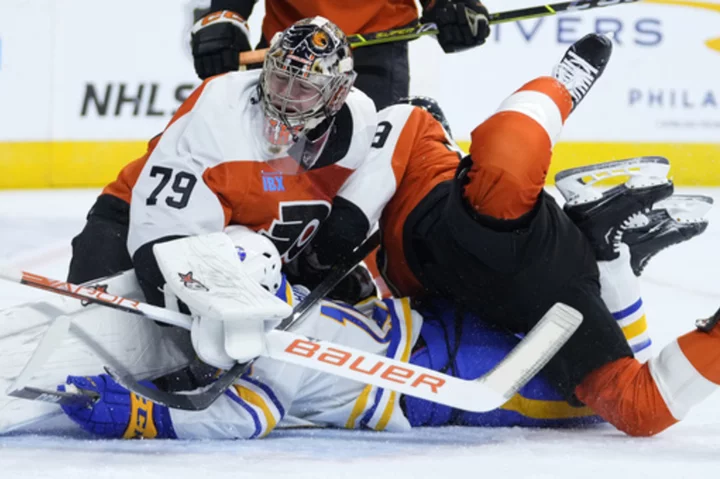 Goaltender Hart leaves Flyers game early with 