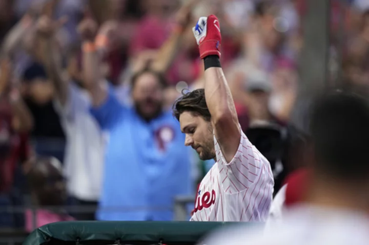 Harper, Turner homer to help lift Phillies over Royals