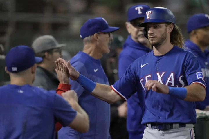 Jankowski scores tying run in seventh, delivers go-ahead RBI groundout in eighth as Rangers beat A's