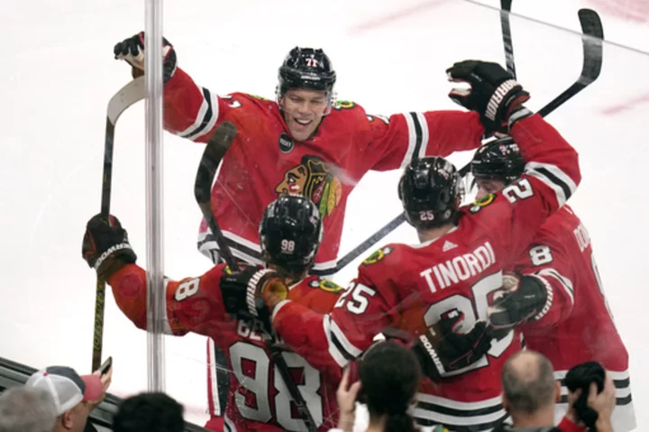 Top draft pick and Blackhawks rookie Bedard scores first NHL goal against Bruins
