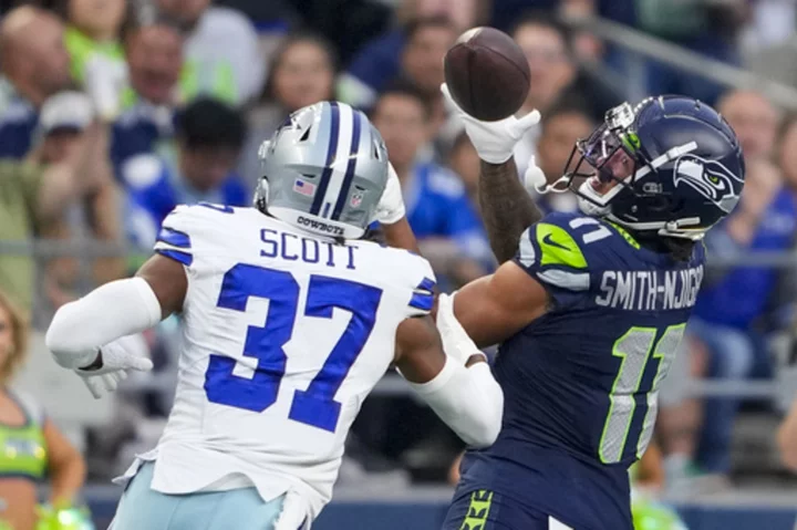 Seahawks starters look sharp in limited action, Seattle tops Dallas 22-14