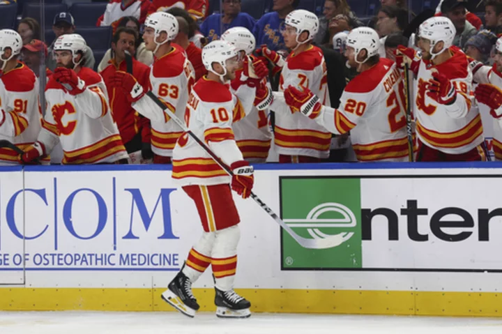 Adam Ruzicka scores the go-ahead goal for the Flames, who beat the sloppy Sabres 4-3