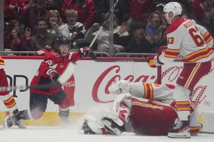 Matthew Phillips scores against his old team, Capitals beat the Flames 3-2 in a shootout