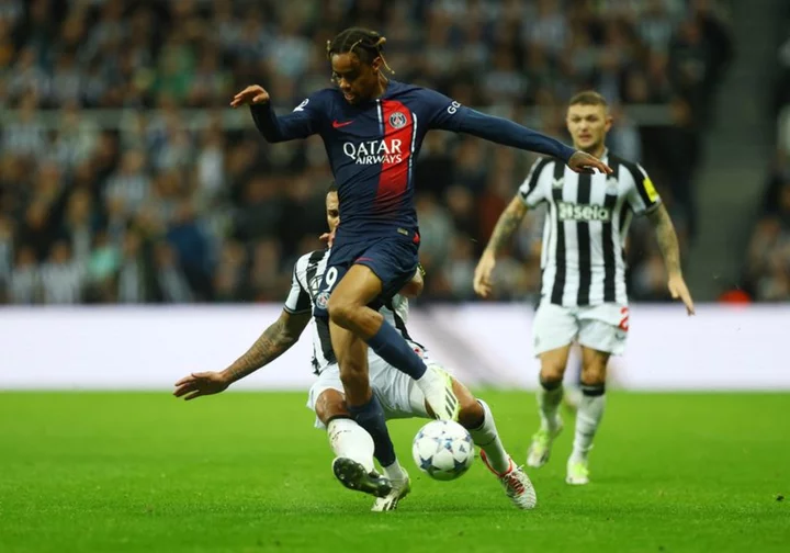 Soccer-Newcastle run riot to secure famous 4-1 win over PSG