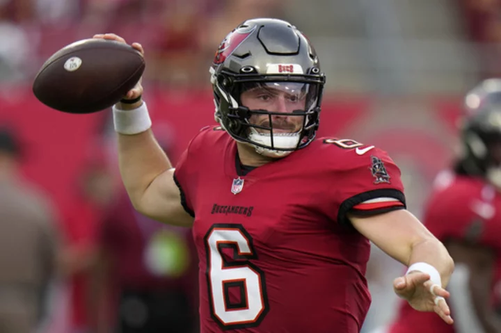 Mayfield makes his Buccaneers debut for 4th team in 3 seasons, in opening visit to Vikings