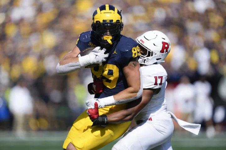 No. 2 Michigan visits Nebraska for first road game. The teams are among eight with 900 all-time wins