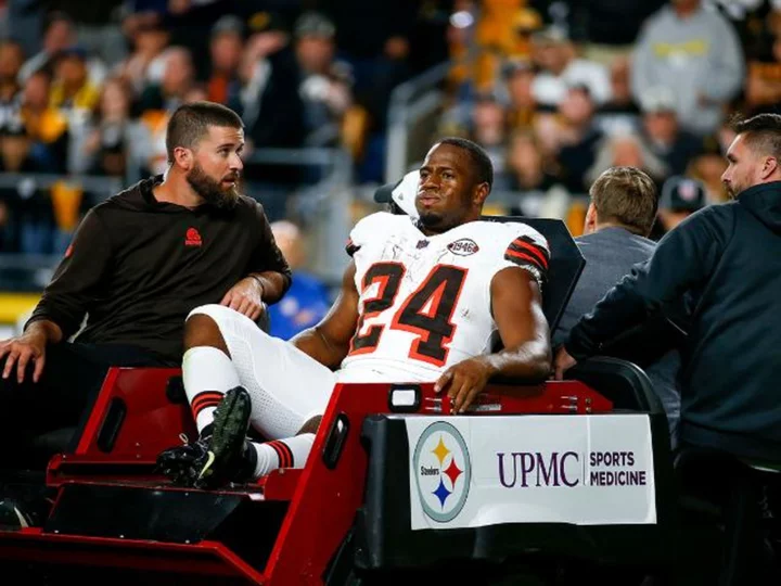 Cleveland Browns running back Nick Chubb carted off the field after knee injury