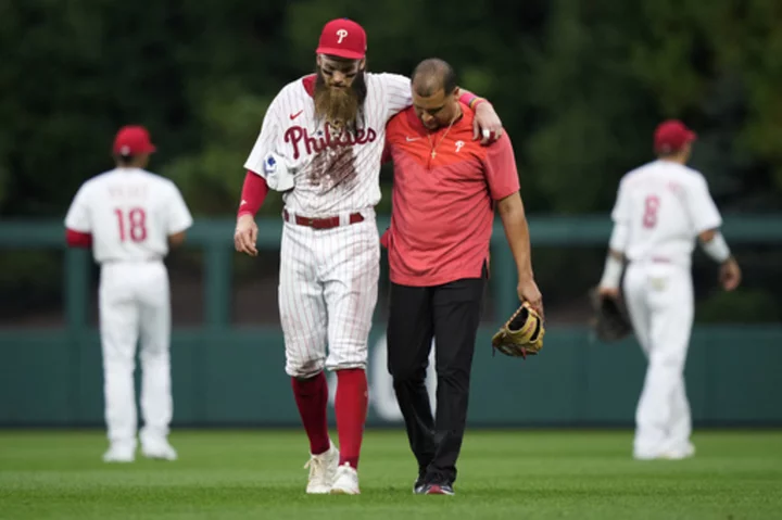 Phillies place OF Marsh on 10-day injured list with left knee contusion