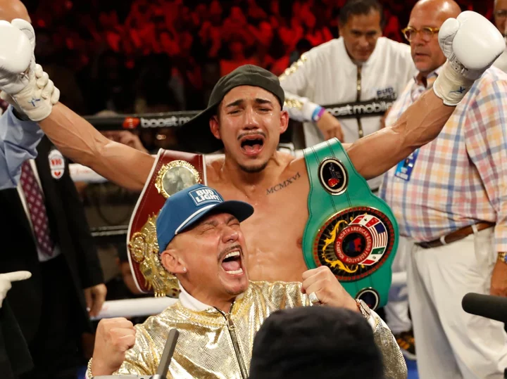 Teofimo Lopez and his father share emotional exchange during Josh Taylor fight
