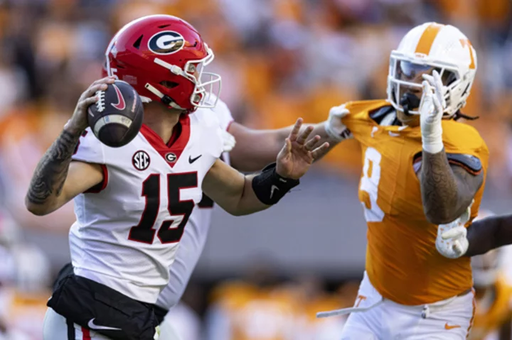 Georgia's Beck, Alabama's Milroe lead teams to SEC title game after replacing big-name QBs