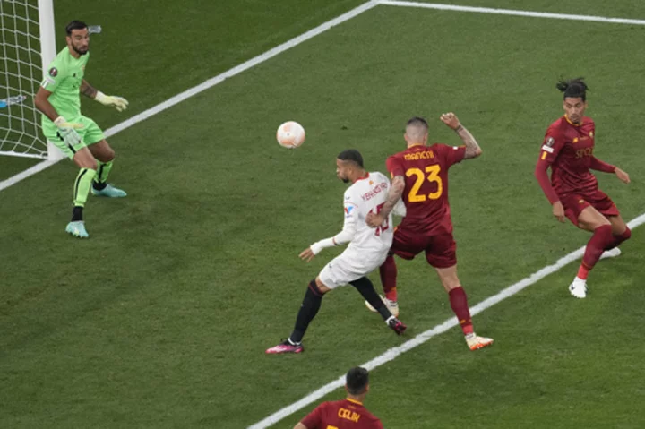 Extra time at Europa League final with Roma, 6-time champ Sevilla tied at 1-1