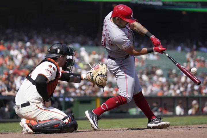 Encarnacion-Strand homers in first career 4-hit game, Reds beat Giants 4-1