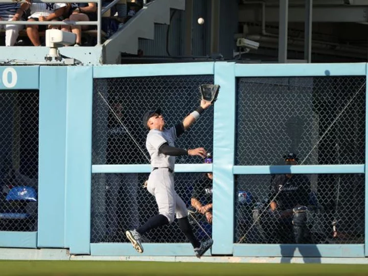 Catch of the year? Aaron Judge crashes through door to make spectacular grab; misses next game with injury