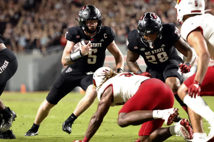 Louisville uses defense to stay unbeaten, top N.C. State 13-10 with late field goal