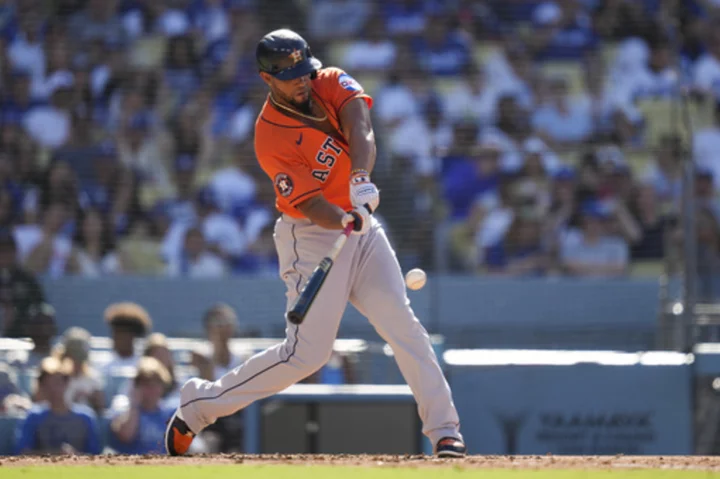 Bregman's RBI in the 11th gives the Astros a win over the Dodgers as Freeman gets 2,000th hit