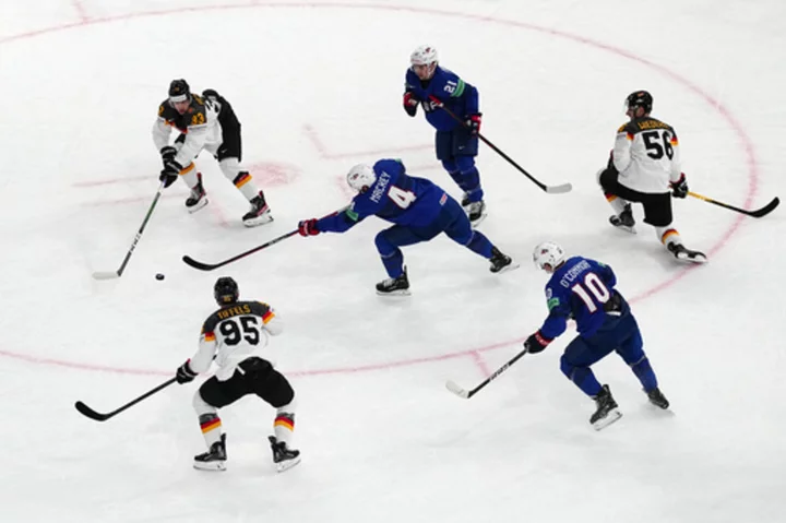 US overcomes Germany, Canada prevails against Slovakia in shootout at ice hockey worlds