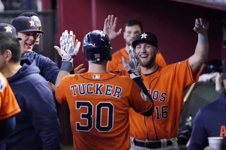 Astros beat Diamondbacks 8-1 to earn third straight AL West title