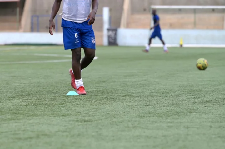 Young Senegalese football lovers flock to artificial turf