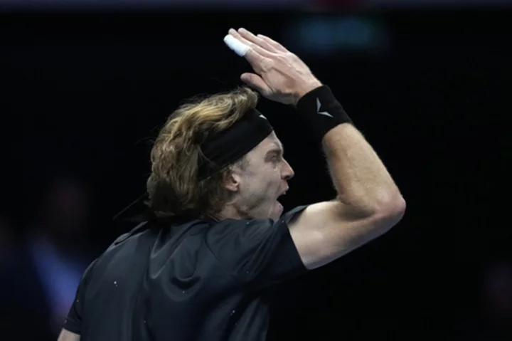 Rublev bloodies himself with his racket in frustration during loss to Alcaraz at ATP Finals