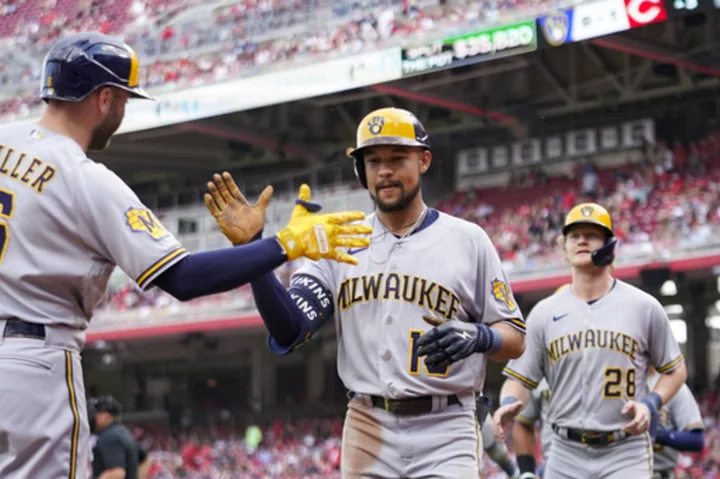 Blake Perkins hits grand slam, Brewers hold off Reds for 10-8 win