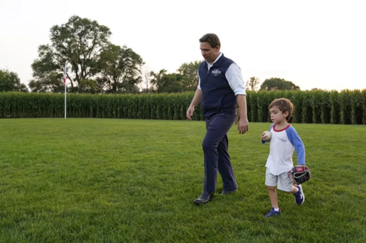 Far away from Trump's jail drama, Ron DeSantis and his family head to Iowa's 'Field of Dreams'