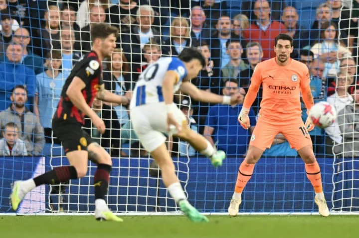 Brighton end Man City's winning run to secure top-six finish