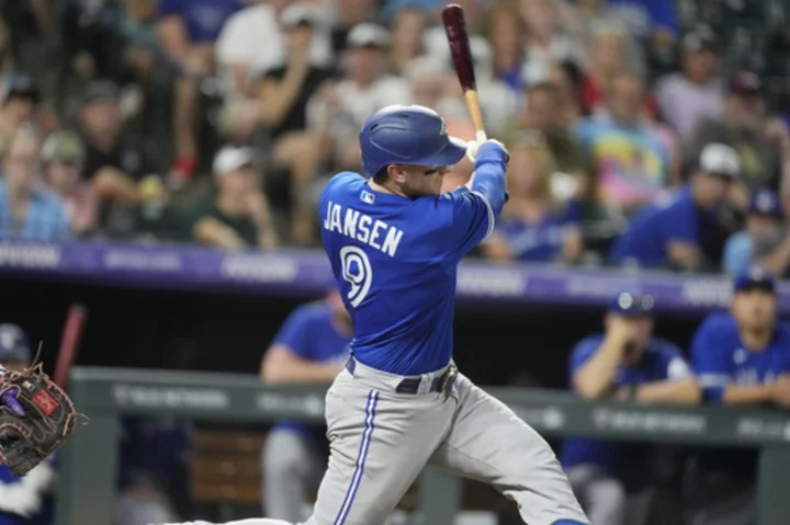 Toronto catcher Danny Jansen fractures finger in the Blue Jays' 13-9 win over the Rockies