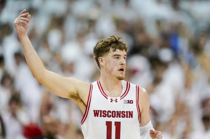 Klesmit's fast start, Wisconsin's rebounding helps Badgers beat No. 3 Marquette 75-64